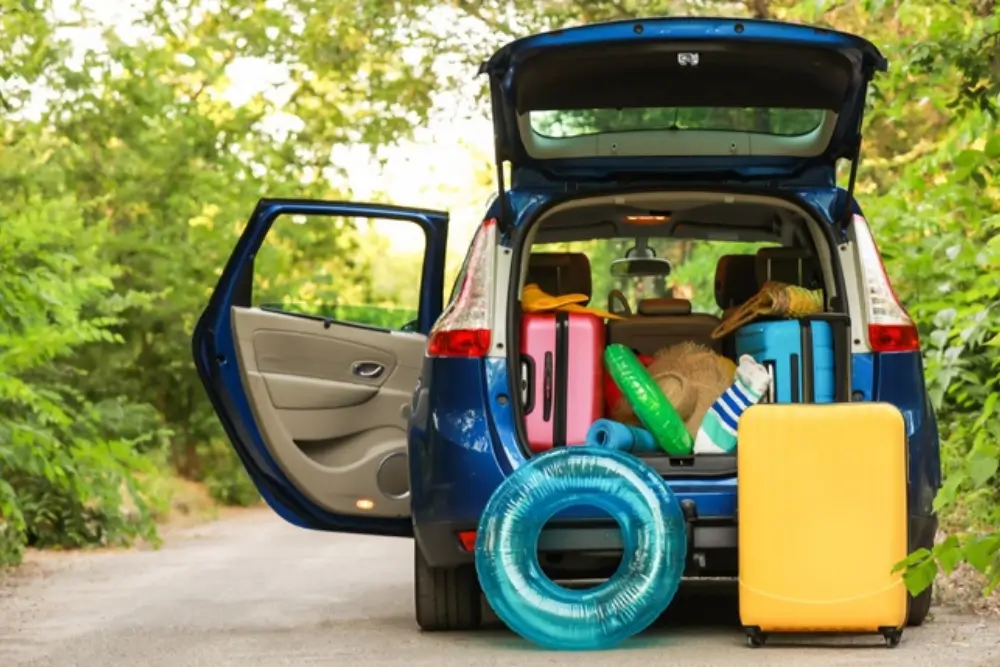 Modern car full of unnecessary items for a summer trip